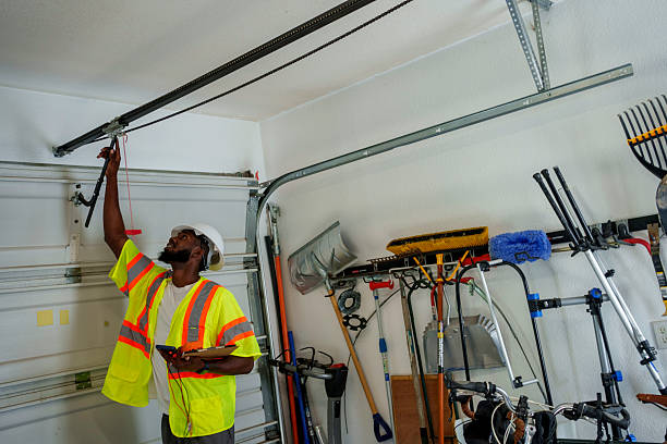 Professional Garage Door Panel Replacement technician working in West Branch, MI